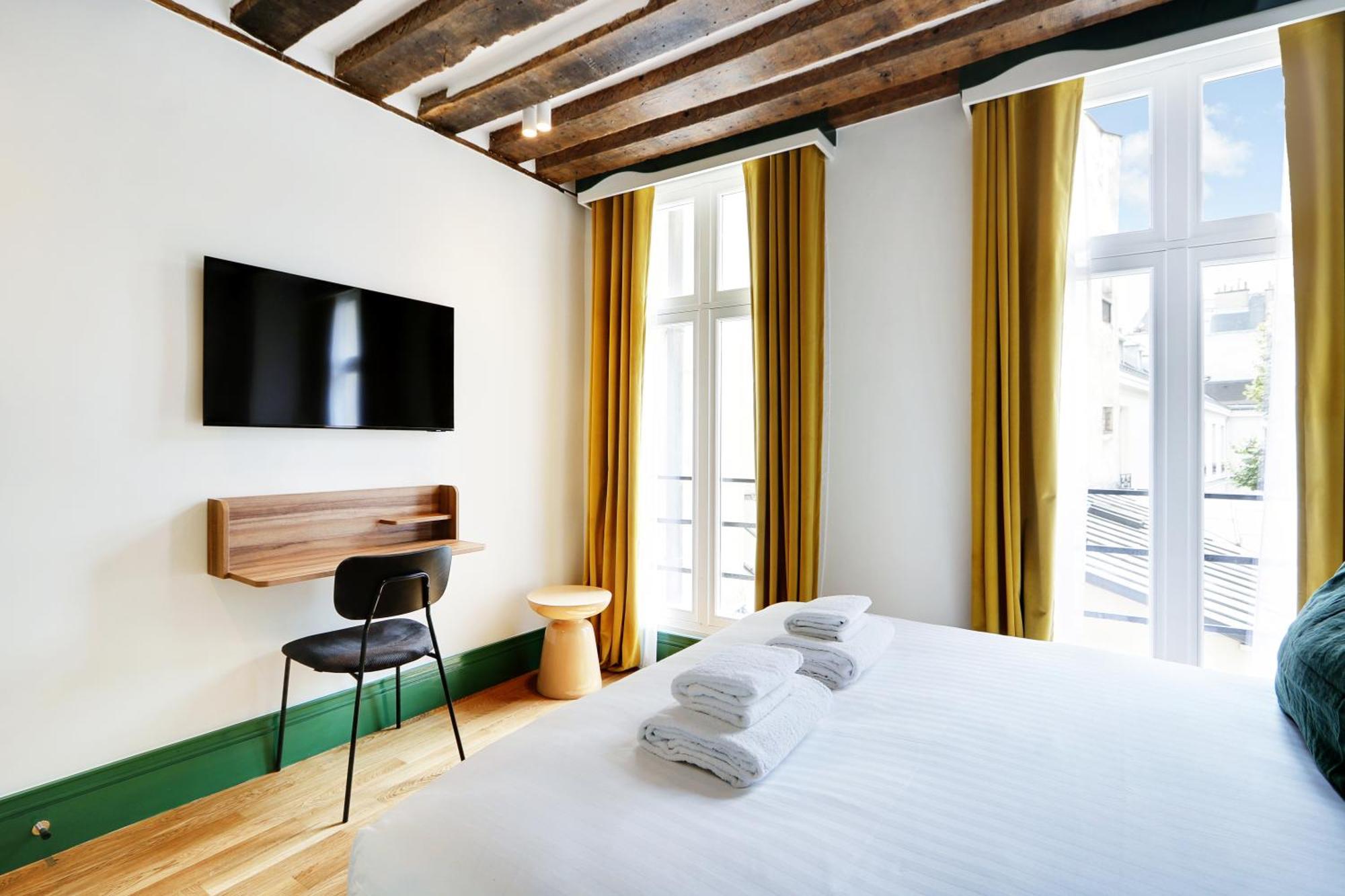 Paris Home Collection Serviced Apartments In Notre Dame - Rue Savoie Esterno foto